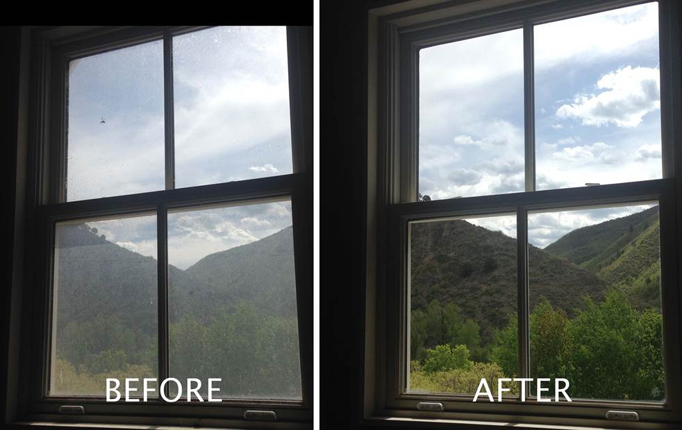 Before and after comparison of a window cleaned by Sud's Spotless, showing a hazy view versus a clear mountain view